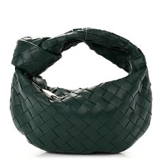 This is an authentic BOTTEGA VENETA Nappa Intrecciato Mini Jodie in Raintree. This stylish bag is beautifully crafted of soft woven lambskin leather in dark green. The bag features a matching handle and a gold top zipper that opens to a compact green leather interior. 1423831 Bottega Veneta Bag Green, Green Bottega Bag, Bottega Jodie, Mini Jodie Bag, Bottega Veneta Green, Icecream In A Bag, Bottega Bag, Bottega Veneta Jodie, Mini Jodie