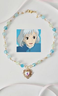 This howls moving castle chocker necklace is perfect for any studio Ghibli inspired outfits .It can be stacked with other necklaces or worn alone for any occasion. It is also the perfect gift for any fan of the movies .  It looks chick and stylish so add this to your collection today and show it off all day long! Length: 14" 💖 handmade with love ✨ aesthetic packaging  🎁gift ready If you need a personalized note please message me Care instructions  *avoid getting wet *store In cool,dry place. P Studio Ghibli Inspired Outfits, Ponyo Jewellery, Ghibli Inspired Outfits, Howl's Moving Castle Jewelry, Studio Ghibli Beaded Necklace, Studio Ghibli Necklace, Ghibli Necklace, Studio Ghibli Jewelry, Ghibli Jewelry