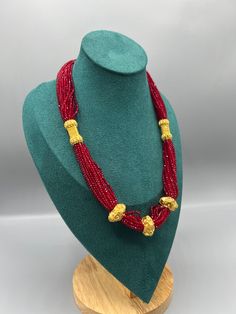 Introducing the exquisite "Nepalese Katar Gedi Hydro Potey Necklace" - a masterpiece inspired by the rich cultural heritage of Nepal. Handcrafted with love and skill by talented artisans, this necklace embodies the essence of Nepalese craftsmanship. Our company offers expedited Next-Day Delivery Services within the United Kingdom, ensuring prompt and efficient transportation of goods.  Additionally, we strive to extend our shipping capabilities to cater to customers worldwide, aiming to provide Festival Celebration Beaded Necklace With Large Beads, Festive Beaded Necklace With Large Beads For Celebrations, Festive Celebration Beaded Necklace With Large Beads, Traditional Polished Beads Necklace For Festivals, Traditional Large Beads Necklace For Festive Occasions, Traditional Polished Bead Necklaces For Festivals, Handmade Temple Jewelry Beaded Necklaces For Festivals, Traditional Faceted Beads Necklace For Gift, Traditional Faceted Beads Necklace As Gift