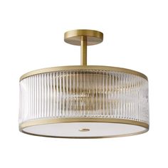 a brass ceiling light with clear glass shades