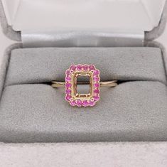 Discover a timeless classic with our Pink Sapphire Ring Semi Mount in Solid 14k Gold! This elegant emerald cut gemstone will make a stunning statement piece that will last for generations. With meticulous milgrain detail, this exquisite ring is the perfect way to show your love forever. 14k Gold Emerald Cut Sapphire Ring With Halo Setting, 14k Gold Emerald-cut Birthstone Ring With Diamond Cut, 14k Gold Emerald Cut Diamond Birthstone Ring, 14k Gold Birthstone Ring With Emerald Cut Diamond, Emerald Cut Ruby Ring In Gold, 14k Gold Birthstone Ring With Emerald Cut Halo Setting, Gold Ruby Ring With Emerald Cut And Accent Stones, Emerald Cut Ruby Ring In Yellow Gold, Rectangular Prong-set Emerald Ring In Yellow Gold