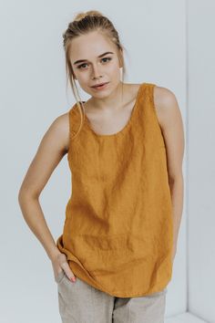 Ersa - women's linen tank top made of soft and washed 100% linen. DETAILS: ♥ 100 % European linen fabric (Oeko-Tex certified), medium weight (185 g) ♥ Perfect for summer: breathable, loose, comfy ♥ For work & for casual wear ♥ Custom measurements can be applied ♥ 25 COLORS to choose ♥ Machine washable ♥ No need to iron - for a relaxed look Please check MORE similar linen tops for women here: https://etsy.me/3t9W6ql https://etsy.me/3qzqgl3 https://etsy.me/3rEDdeG ----------------------------- Red Linen Dress, Linen Shirts Women, Linen Tops, Girls White Dress, White Linen Shirt, Shirt Linen, White Flower Girl Dresses, Linen Tank Top, Linen Summer