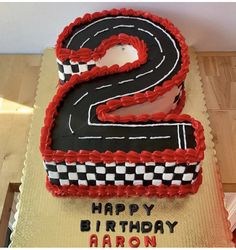 a birthday cake with the number two on it