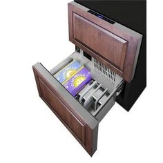 the drawer is open to reveal an assortment of items in it's storage compartment