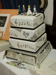 a wedding cake with music notes on it