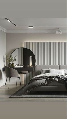 a bedroom with a bed, mirror and desk in it's centerpieces