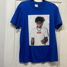 Brand-New, Collectible, Supreme Youngboy T-Shirt, Size Small, Call Aaron Royal Blue. It Is A Little Bit Of Pulling On The Canvas With That Showed In The Picture. No Big Flos Prices Discounted. Blue Crew Neck Shirt For Streetwear, Casual Blue Tops For Streetwear, Casual Blue Shirt For Streetwear, Trendy Blue Shirt For Streetwear, Supreme Box Logo Tee, Supreme Tshirt, Supreme Shirts, Supreme T Shirt, Red Tshirt