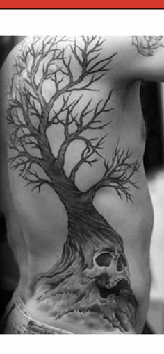 a man with a tree tattoo on his back