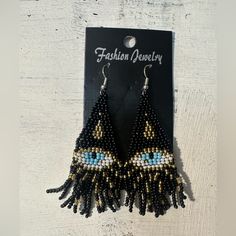 Brand New Black Beaded Evil Eye Tassel Earrings Eye Of Protection Earrings New Approximately 3 Inches J7 Bohemian Black Tassel Earrings With Round Beads, Black Bohemian Tassel Earrings With Round Beads, Black Beaded Dangle Tassel Earrings As Gift, Dangle Tassel Earrings With Black Beads For Gift, Black Tassel Earrings With Dangling Beads As Gift, Trendy Tassel Earrings With Dangling Beads, Gift Tassel Earrings With Black Beads In Dangle Style, Black Dangle Jewelry With Fringe, Black Fringe Dangle Jewelry