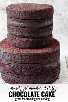 a stack of chocolate cakes sitting on top of each other