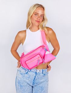 Our Fanny Sling is the cross body bag you've been waiting for! This silhouette hugs your body in all the right places and is the perfect medium size that will hold your necessities without weighing you down. Features super soft match nylon webbing, tonal piping details, match buckle, a padded exterior for extra comfort and insulation, 3 separate zipper compartments, and two additional pockets in the main compartment. Coordinating paracord pulls make opening this bag a cinch! Comes with a matchin Nylon Crossbody Bag With Water Bottle Pocket, Trendy Nylon Crossbody Belt Bag, Sporty Nylon Chest Bag With Adjustable Strap, Nylon Crossbody Belt Bag With Zipper Pocket, Trendy Nylon Belt Bag For Outdoor Activities, Sporty Nylon Chest Bag With Functional Pockets, Nylon Crossbody Belt Bag With Removable Pouch, Sporty Nylon Shoulder Bag With Water Bottle Pocket, Sporty Nylon Belt Bag With Removable Pouch