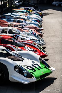 a row of race cars parked next to each other