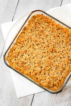 a casserole dish is sitting on a napkin