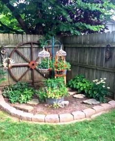 an outdoor garden with lots of plants in it