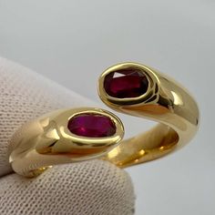 For Sale on 1stDibs - Vintage Cartier Oval Cut Red Ruby 18k Yellow Gold Split Bypass Ring. Stunning yellow gold ring set with 2 fine deep red oval cut rubies. Fine jewellery Cartier Vintage Ring, Luxury Oval Ruby Ring With Polished Finish, Vintage Cartier Ring, Cartier Gemstone Jewelry For Gifts, Oval Cartier Rings For Formal Occasions, Cartier Oval Rings Fine Jewelry, Cartier Oval Fine Jewelry Rings, Oval Cartier Hallmarked Jewelry, Luxury Yellow Gold Oval Ruby Ring