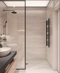 a bathroom with two sinks and a shower