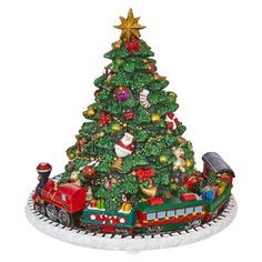 a christmas tree with train around it and presents on the top, in front of a white background