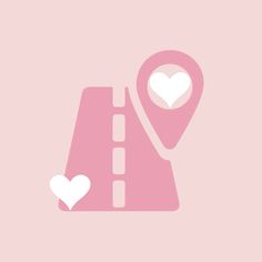 a map with a heart on it next to a pink wall and a light pink background