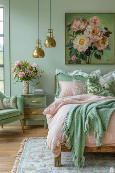 a bedroom with green walls and pink flowers on the bed, along with two chairs