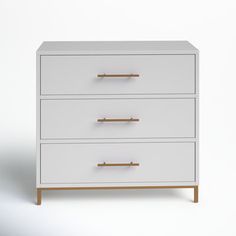 a white chest of drawers with three brass handles on each drawer and one closed drawer