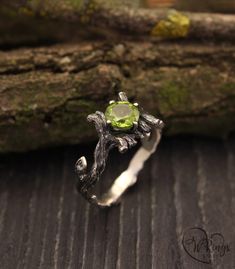 Peridot twig engagement ring with leaves, Topaz on branch ring, Silver ring with topaz, Women's silver ring, Unique topaz ring for woman ■ All wedding rings are only crafted with the finest of recycled metals DETAILS: Main stone - 7mm natural Peridot Additional stones - 1,5mm Cubic Zirconia Metal - Sterling Silver 925 Dimensions - width 10mm (0,393), band width - 3mm (0,118 in.) Finish - oxidized (shiny at your request - shown in the last photo) Please choose your ring size and gem in menu while Nature-inspired Hand Forged Promise Ring, Engagement Ring With Leaves, Ring With Leaves, Earthy Rings, Character Jewelry, Fairy Glitter, Branch Engagement Ring, Witch Rings, Twig Engagement Ring