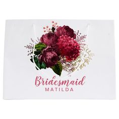 a white bag with flowers on it that says grandma of the bride matilda