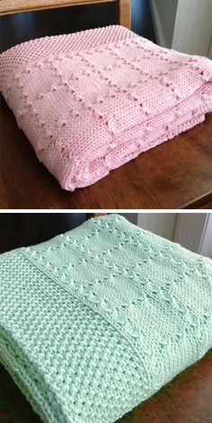 there is a pink and green knitted blanket on top of a wooden table next to a chair