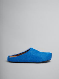 Fussbett Sabot in long hair leather. Barefoot feeling. Fussbett inner sole in leather. Ribbed rubber sole. Blue Leather Sole Slip-on Mules, Blue Leather Clogs With Leather Footbed, Blue Slip-on Mules With Leather Sole, Blue Leather Flat Heel Mules, Blue Leather Mules With Flat Heel, Blue Leather Closed Toe Slippers, Blue Leather Slippers With Round Toe, Blue Leather Mules With Leather Sole, Blue Slip-on Clogs With Leather Sole