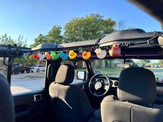 the interior of a car with decorations on it