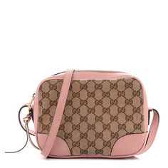 This is the authentic GUCCI Monogram Mini Bree Messenger Bag in Beige and Soft Pink. This crossbody bag is crafted of brown and beige monogram canvas with light pink leather trim. The bag features an adjustable leather shoulder strap and light gold hardware. The crossbody opens to a natural fabric interior with a patch pocket and pink leather card slots. Gucci Monogram, Brown And Beige, Natural Fabric, Pink Leather, Natural Fabrics, Monogram Canvas, Leather Trim, Leather Trims, Soft Pink