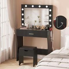 a bedroom with a bed, vanity mirror and stool in front of a window that has light bulbs on it