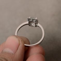 This is a gorgeous handmade creation. Its beauty is its simplicity & Elegance. The 5*5mm square cut natural aquamarine (March birthstone) is solid sterling silver and with rhodium plated. All item is sent in a beautiful gift box You can realize more lovely stuff clicking the link https://www.etsy.com/shop/knightjewelry?refshopsection_shophome_leftnav Please leave the correct address and you phone number for delivering successfully. Princess Cut Emerald Promise Ring, Silver Moissanite Diamond Ring Rectangular, Rectangular Tension Setting Ring As A Gift, Silver Princess Cut Birthstone Ring, Promise Sterling Silver Princess Cut Birthstone Ring, Silver Emerald Ring With Princess Cut, Minimalist Silver Emerald Cut Diamond Ring, Silver Emerald Ring With Princess Cut And Prong Setting, Silver Princess Cut Emerald Ring With Prong Setting