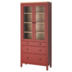 a red cabinet with glass doors and drawers on the bottom shelf, against a white background