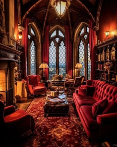 a living room filled with lots of red furniture