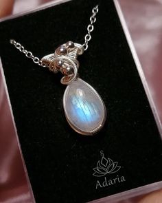 Handmade Rainbow Moonstone necklace.Made with solid silver 999 wire and natural Moonstone stone.there is a silverplated chain to the necklace (45 cm long).This jewel is very elegant and feminine and would make a beautiful gift for a loved one. A stone for "new beginnings", Moonstone is a stone of inner growth and strength. It soothes emotional instability and stress, and stabilises the emotions, providing calmness. Moonstone enhances intuition, promotes inspiration, success and good fortune in l Elven Necklace, Elven Jewelry, Inner Growth, Rainbow Moonstone Necklace, Fairy Necklace, Moonstone Stone, Moonstone Necklace, Blue Fire, Necklace Blue