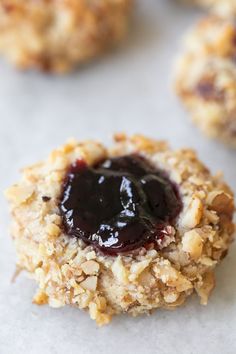 an oatmeal cookie with jam on top