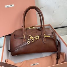 Luxury Brown Miu Miu Shoulder Bag, Luxury Vintage Brown Bucket Bag, Miu Miu Brown Bag With Gold-tone Hardware, Luxury Brown Box Bag With Gold-tone Hardware, Vintage Ferragamo Bag, Expensive Bag, My Style Bags, Handbag Shoes, Exclusive Collection