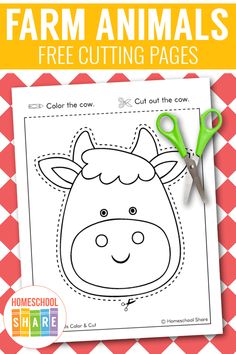 the farm animals cut out page is shown with scissors and paper on top of it