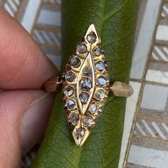 Sweet Victorian 14K yellow gold & rose cut diamond ring in a marquise shape! There are 17 rose cut diamonds across the front of the ring in a marquise setting. The diamonds measure 1.5mm to 2.25mm each, and have natural inclusions. Please ask all necessary questions prior to placing an order. Measurements: The size is 6 US, and can be sized for a fee. Condition: The overall all condition of this ring is very good. Victorian 14k Gold Ring With Rose Cut Diamonds, Victorian 14k Gold Diamond Ring With Rose Cut Diamonds, Gold Pear-shaped Rose Cut Diamond Ring, 14k Gold Marquise Diamond Ring With Single Cut Diamonds, Formal Marquise Diamond Ring With Rose Cut, Heirloom Marquise Cut Single Diamond Ring, Antique Marquise Yellow Gold Diamond Ring, Antique Marquise Rose Cut Diamond Jewelry, Antique Marquise Diamond Ring