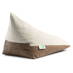 the pillow is made from linen and has a green tag on it's side