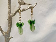 lampwork glass bead, 14kt gold plated findings handmade bok choy earring.  each bead is individual and will be different.  delicate, handle with care and avoid high drops. Whimsical Green Dangle Jewelry, Spiritual Green Earrings For Gift, Whimsical Green Dangle Earrings, Green Spiritual Earrings For Gift, Green Nature-inspired Dangle Jewelry, Green Novelty Dangle Jewelry, Green Handmade Novelty Earrings, Cottage Core Vibes, Types Of Ties