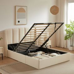 a bed that has been opened and is in the middle of a room