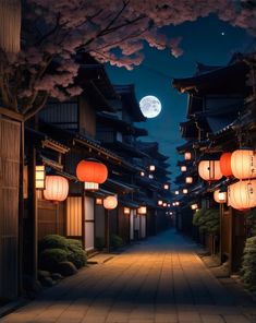 an alley with lanterns lit up at night