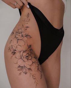 a woman's stomach with flowers on it