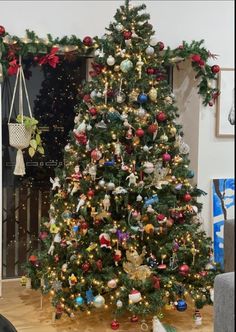 a decorated christmas tree in a living room