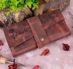 Looking for a stylish and personalized gift for that special woman in your life? Look no further than our Birth Flower Gift - Personalized Women's Leather Wallet, the Legendary Cleopatra Women's Wallet! Crafted with care using high-quality leather and designed with a timeless aesthetic, this wallet is the Crafted from top-notch full-grain leather, this wallet is not only durable but also exudes a luxurious feel that any woman would love. The wallet is made even more special with the option to personalize it with a name and birth month flower, making it a thoughtful gift for any occasion, especially Mother's Day! Order now and give the gift that she'll cherish for years to come! > Made of Real Full Grain Red Leather  > The wallet features a spacious interior that can accommodate all of your Rectangular Wallets For Daily Use On Valentine's Day, Valentine's Day Gift Wallets With Card Slots, Valentine's Day Wallets With Card Slots, Valentine's Day Wallet Gift With Card Slots, Valentine's Day Gift Wallet With Card Slots, Gift Wallets With Interior Card Slots, Wallet Craft, Wedding Bags, Birth Month Flower