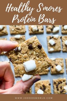 healthy s'mores protein bars with chocolate chips and marshmallows on top