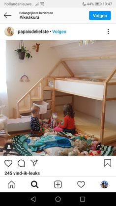 a child sitting on the floor in front of a bunk bed with a loft above it