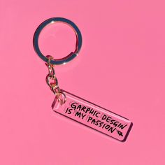 a keychain that says,'graphic design is my passion'on it