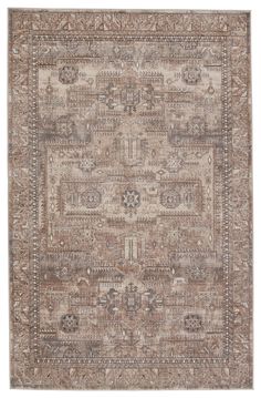 an area rug with brown and beige colors